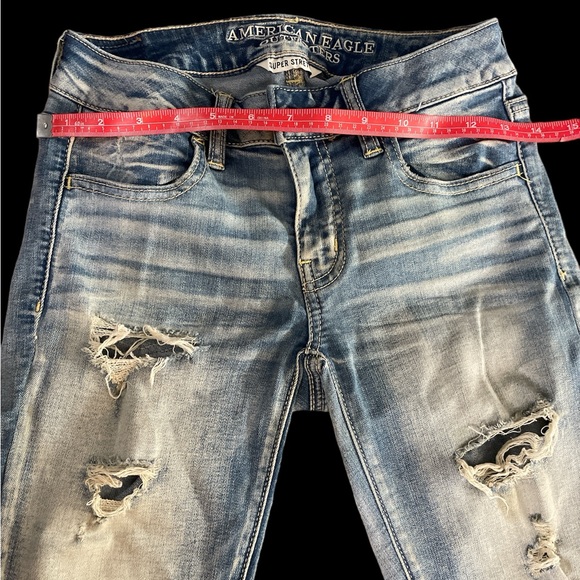 American Eagle Outfitters super stretch sz 0 light wash ripped soft jeans - Picture 6 of 6